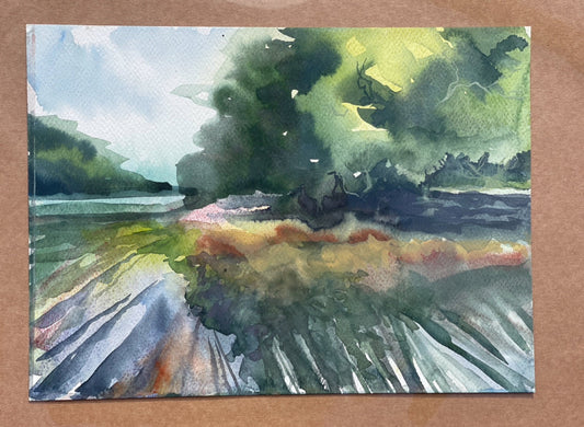 A vibrant watercolor landscape painting featuring a sunlit path with wild hedgerows and trees, with cool blues, deep forest greens, and soft golds.